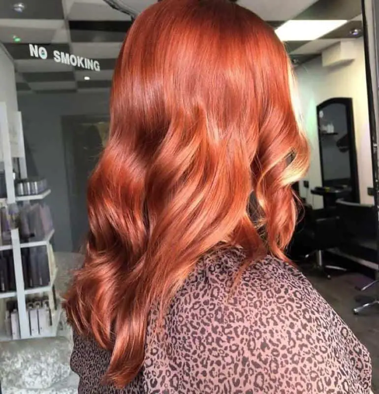 Short And Curly Red Hair With Blond Highlights 2
