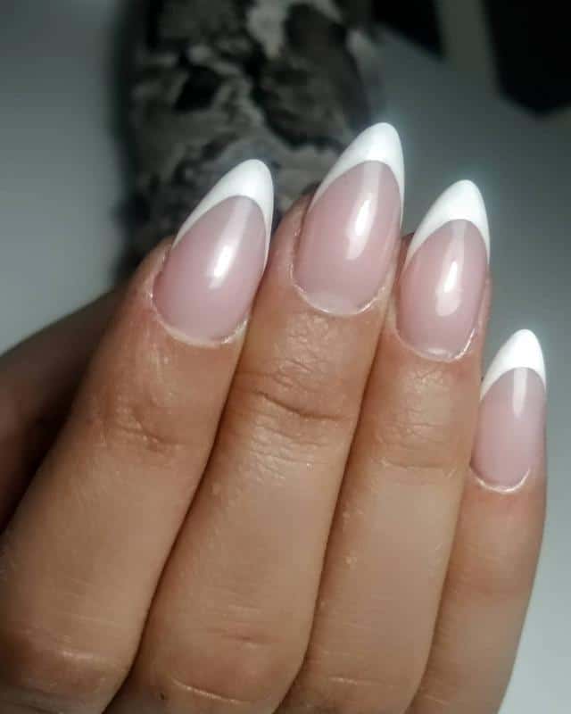 60 Elegant French Tip Nail For A Super Trendy Manicure (2023 Update) 54 Stiletto French Nail 3