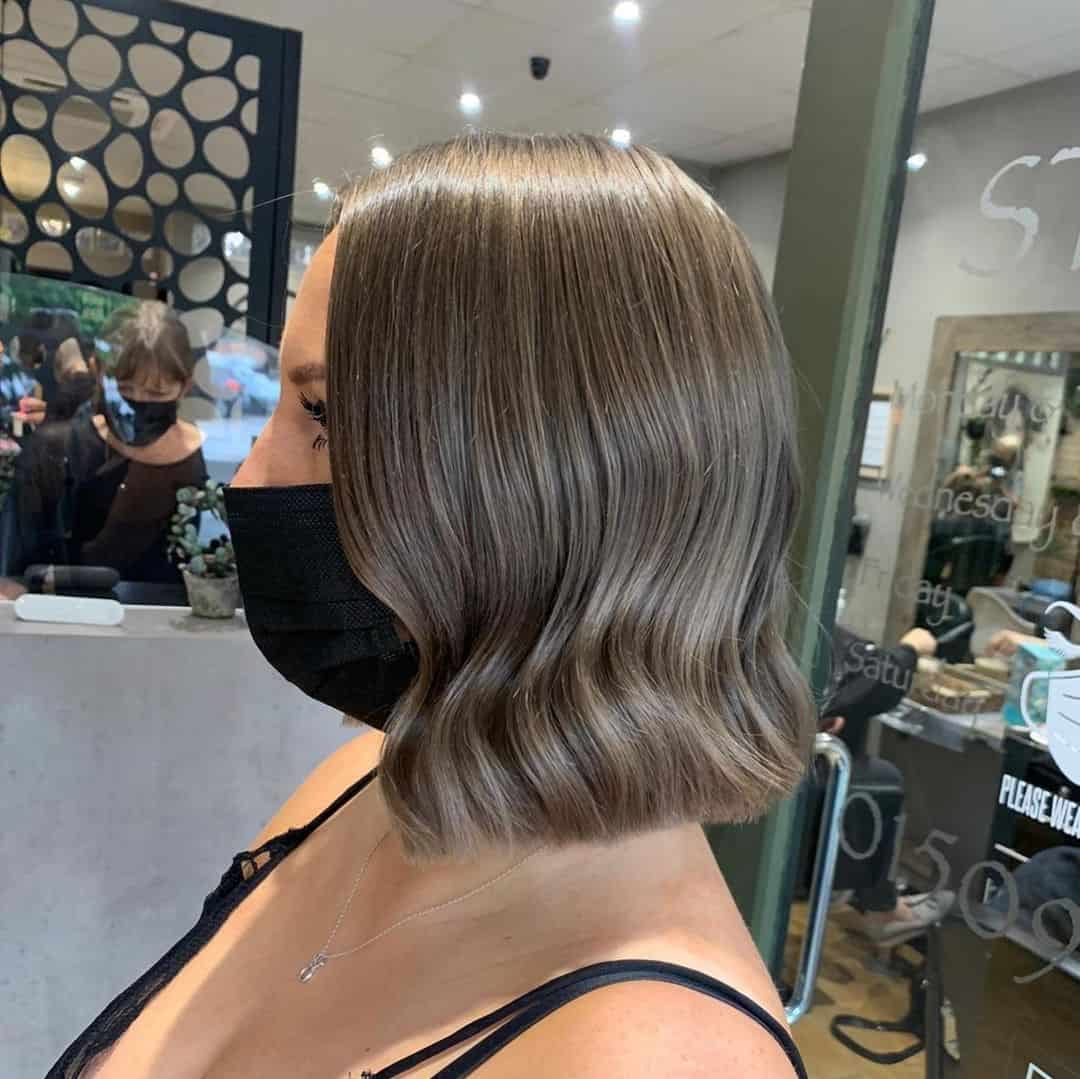 Top 40 Gorgeous Colored Bob Hairstyles (2023 Update) 17 Wavy Ashy Color Bob Hairdo
