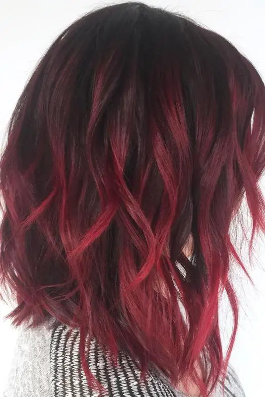 70+ Red Hairstyle With Highlights, Lowlights and Balayage (2023 Update) 21 Wavy Burgundy Hairstyle 1