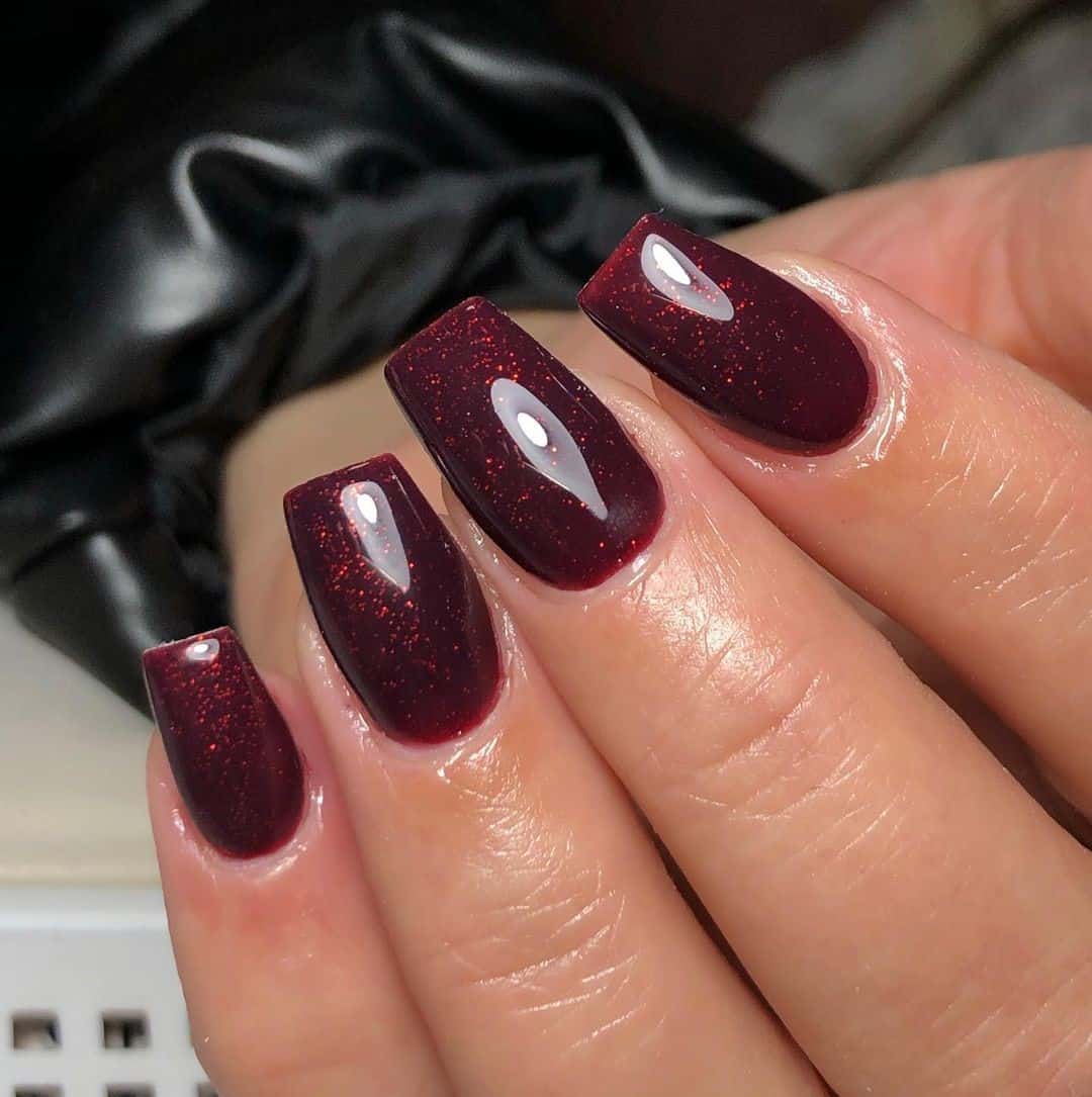 Burgundy Glitter Nails