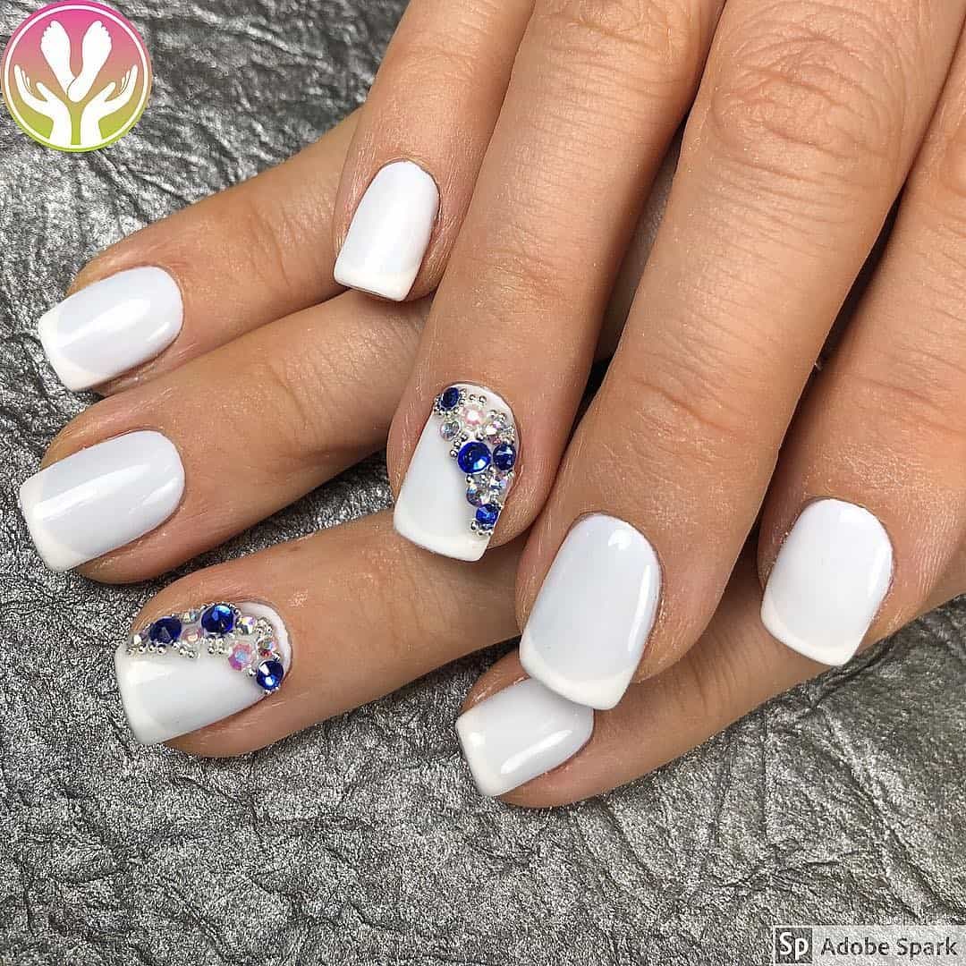 Feminine White Nail Designs With Diamonds