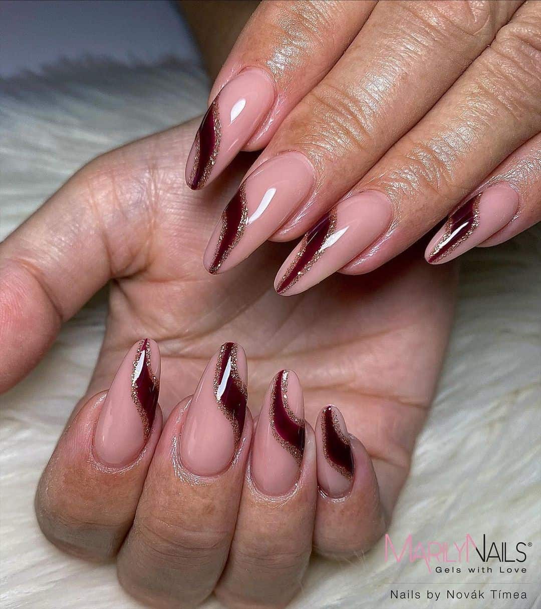 Long Oval Burgundy Nail Manicure 