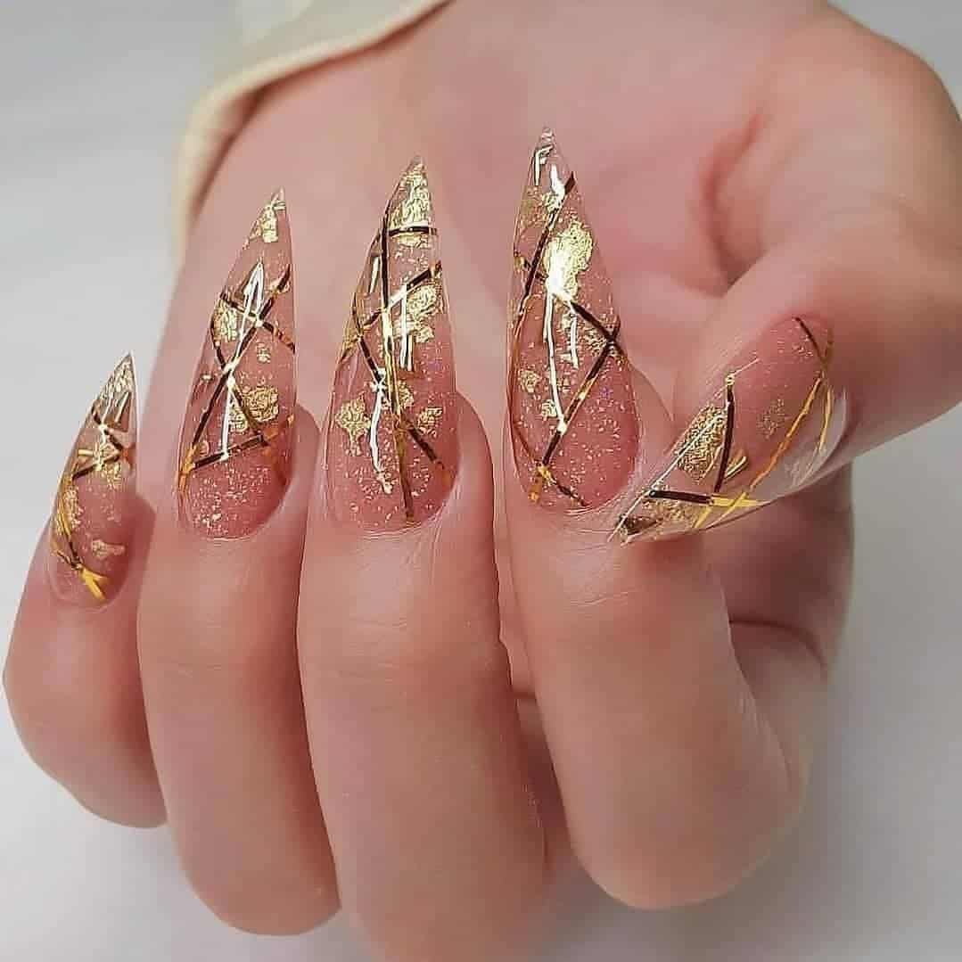 Oval Gold Nail Designs With Diamonds