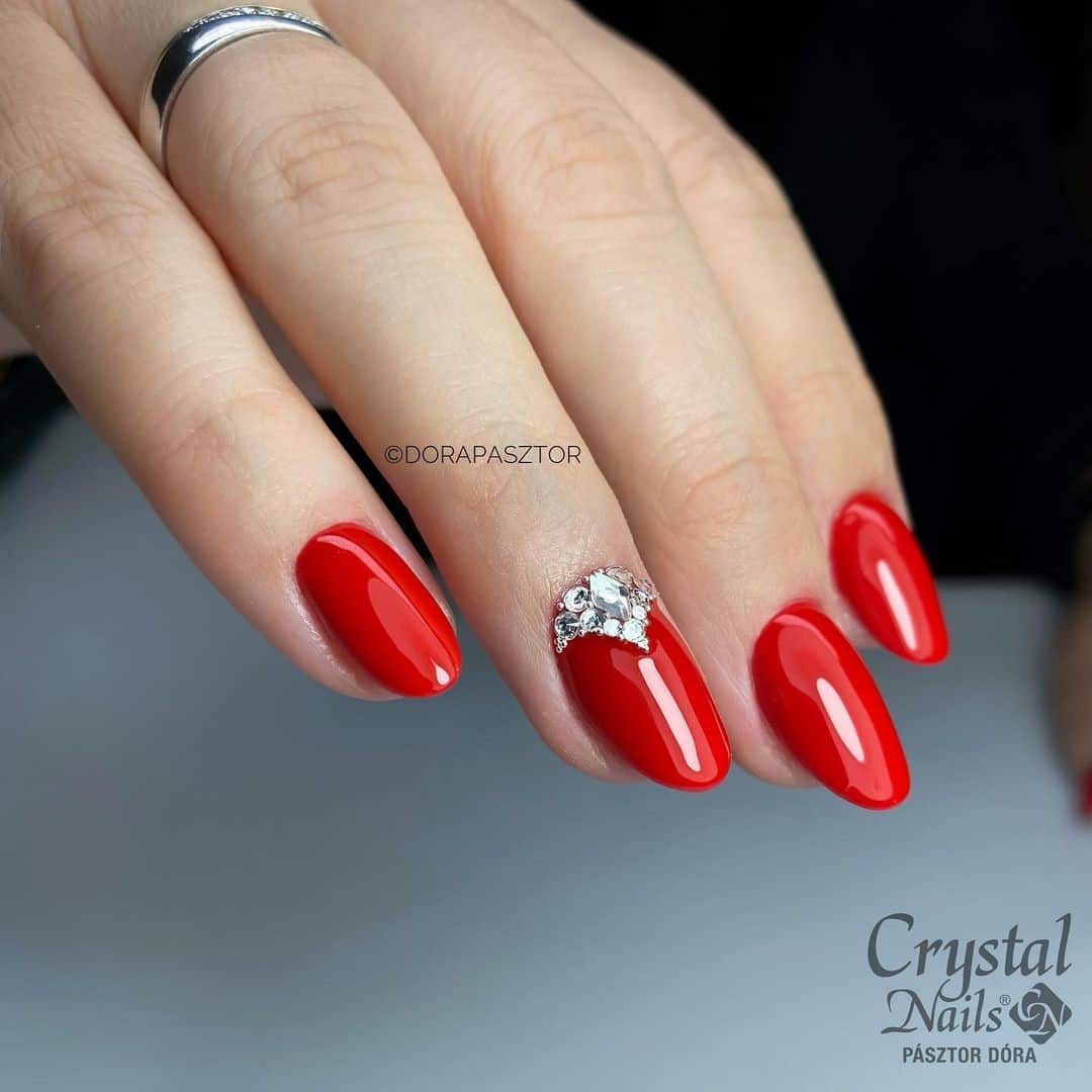 Oval Red Winter Nails With Gemstones