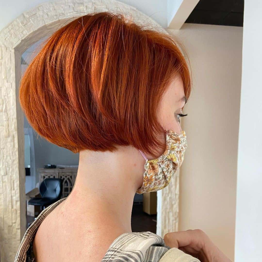 Bright Orange Copper French Bob Haircut