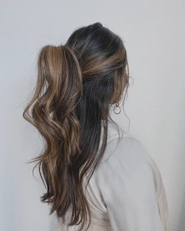 30 Claw Clip Hairstyles That Will Make You Look Stunning 11 Half Ponytail Style