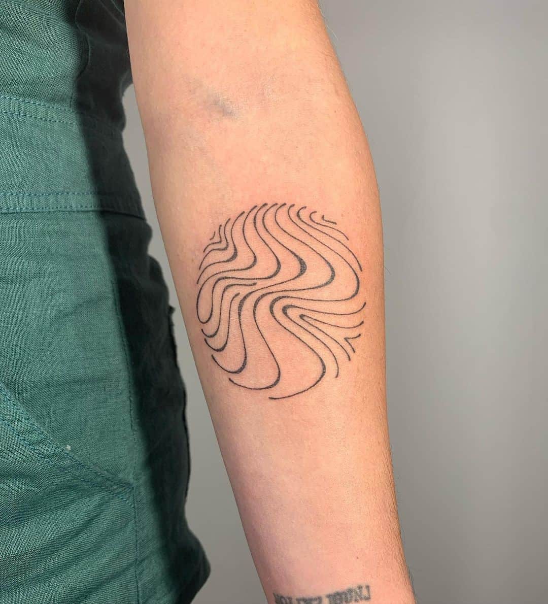 Artsy Black Circle Tattoo