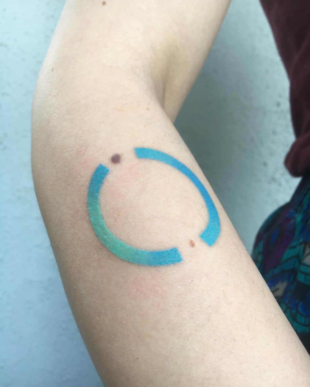 Top 37 Gorgeous Circle Tattoo Design Ideas 2022 (Small, Big, Black, Colorful) 27 Blue Circle Tattoos