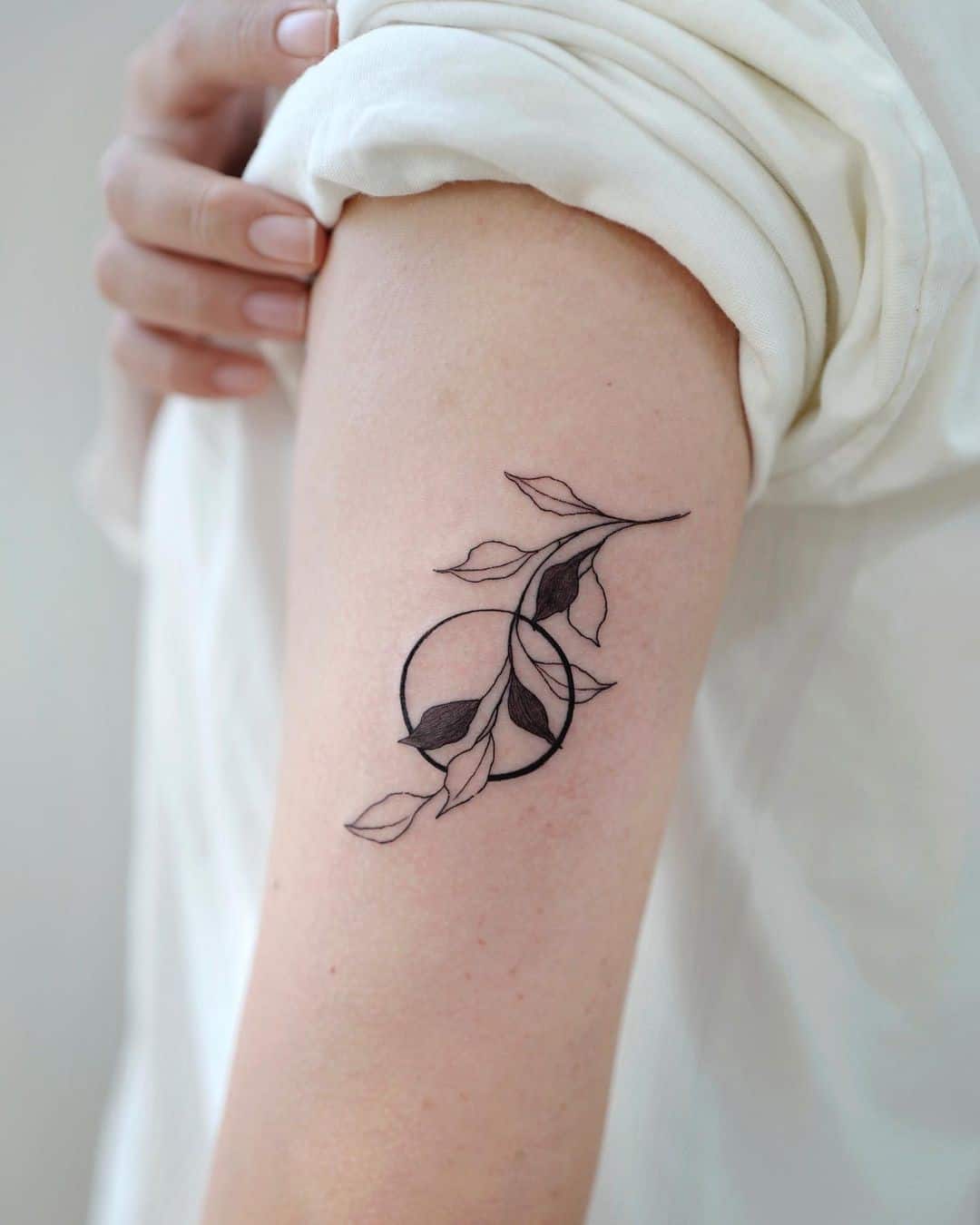 Top 37 Gorgeous Circle Tattoo Design Ideas 2022 (Small, Big, Black, Colorful) 22 Floral Leaf Tattoo