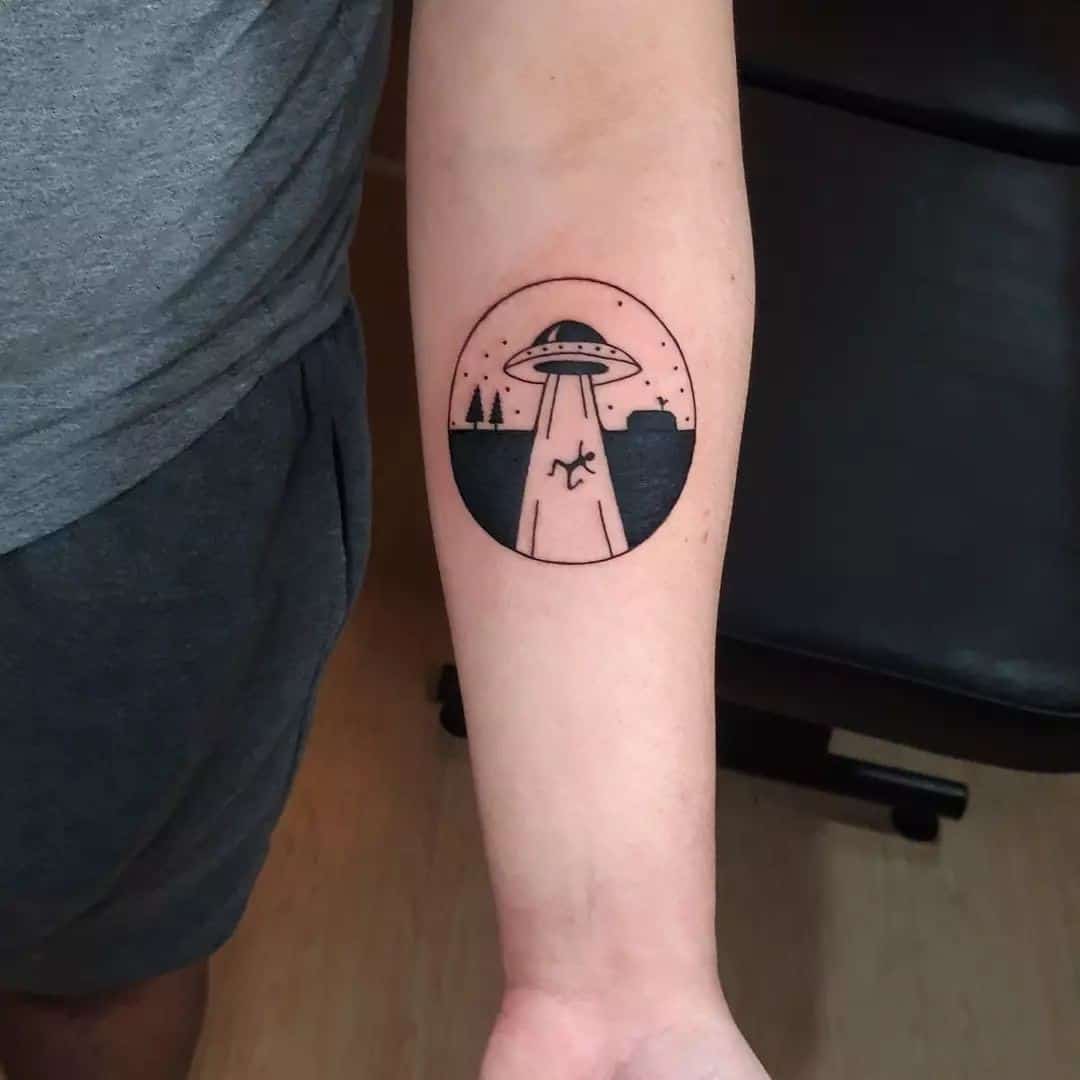 Forearm Circle Tattoo Alien Design