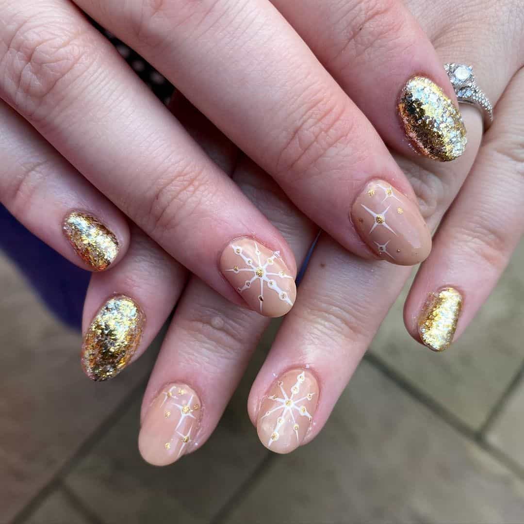 Top 33 Sweet Snowflake Nail Design Ideas For Winter 7 Natural Oval Snowflake Nails