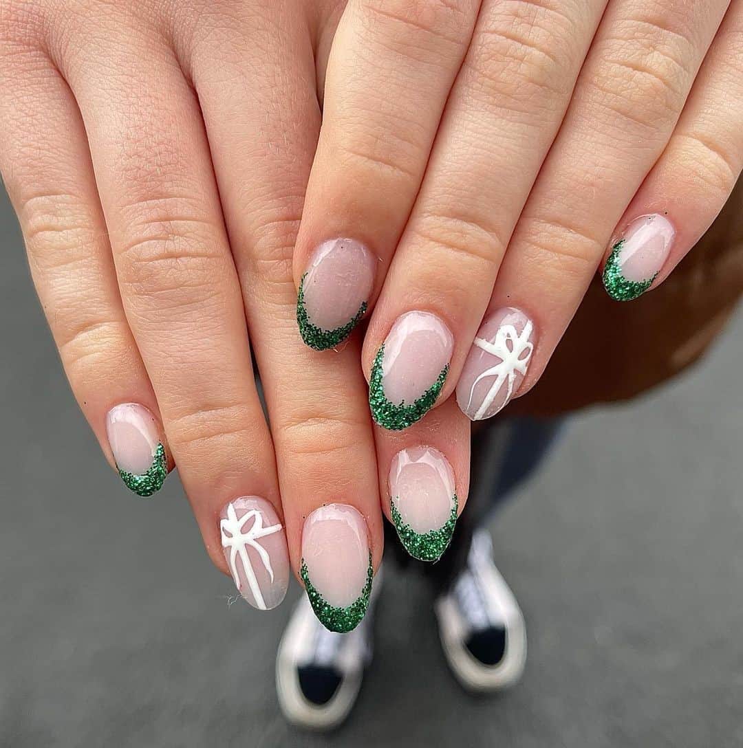 Top 31 Gorgeous Short Christmas Nail Design Ideas 11 Oval Glitter Christmas Nails