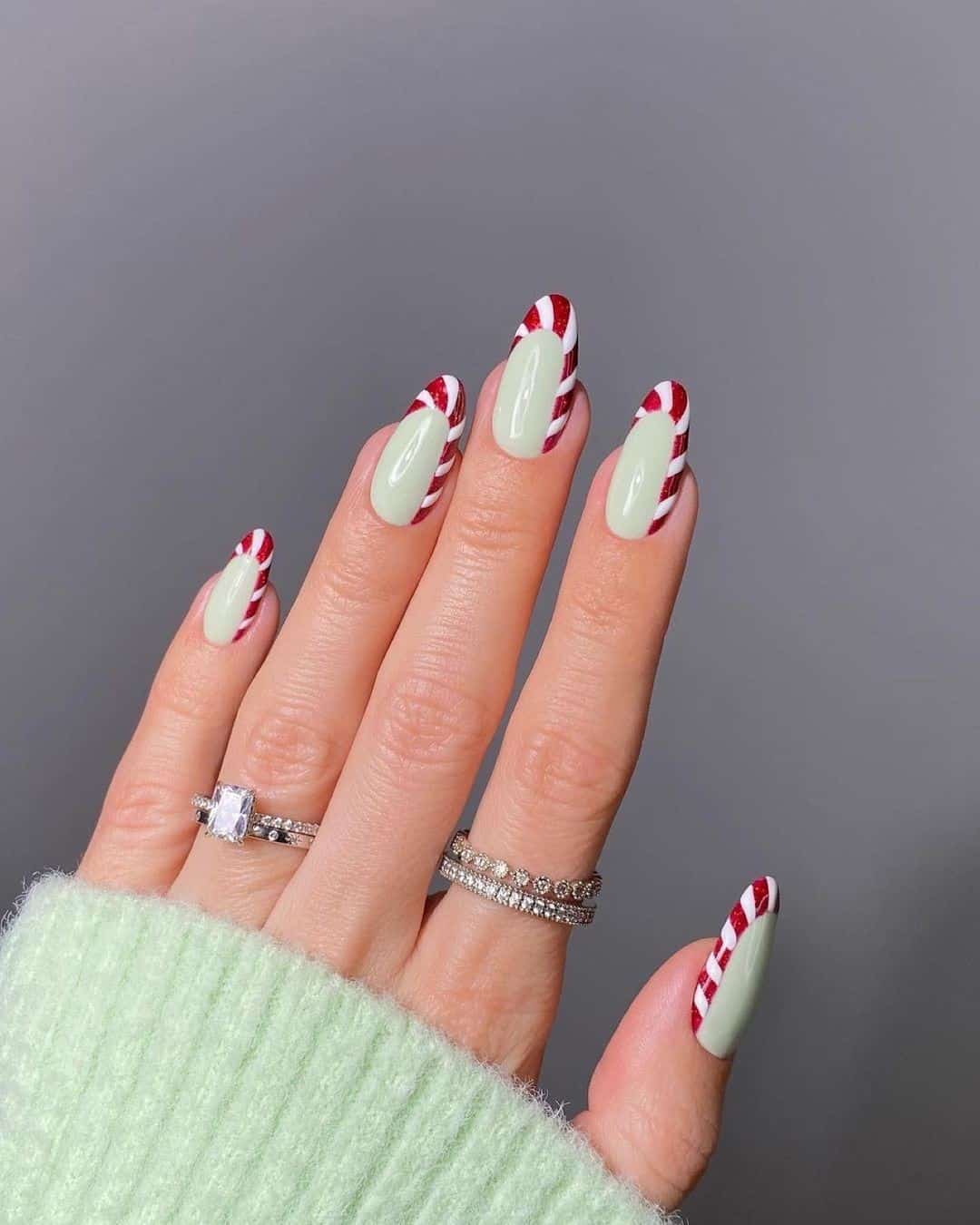 35 Elegant Christmas Acrylic Nail Design Ideas 2022 34 Oval Manicure With Red Details
