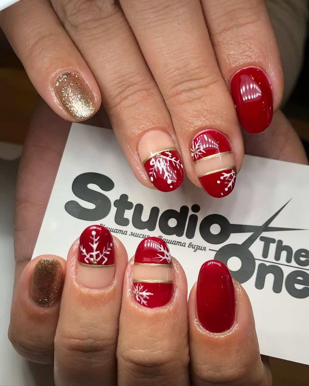 Oval Red Christmas Nails With A Pop Of Gold
