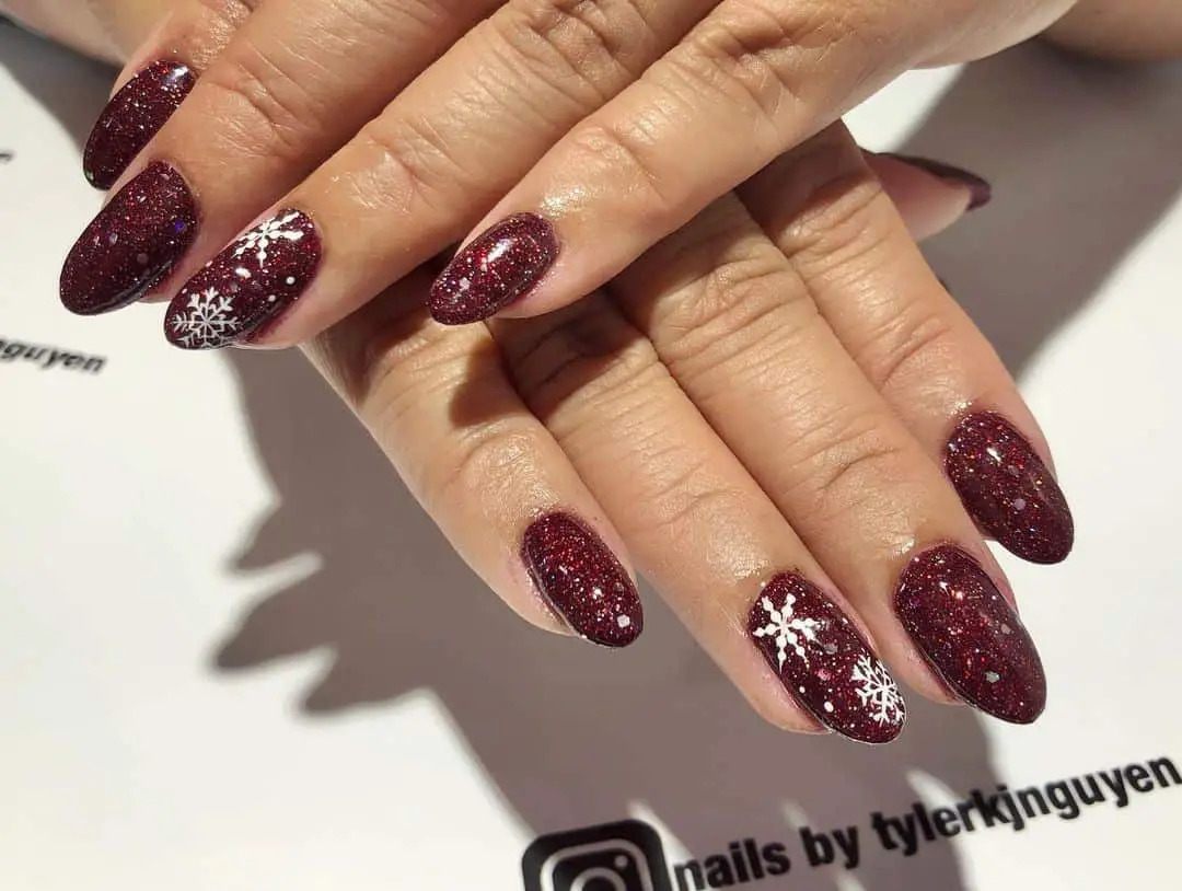 Top 33 Sweet Snowflake Nail Design Ideas For Winter 15 Oval Shiny Burgundy Mani